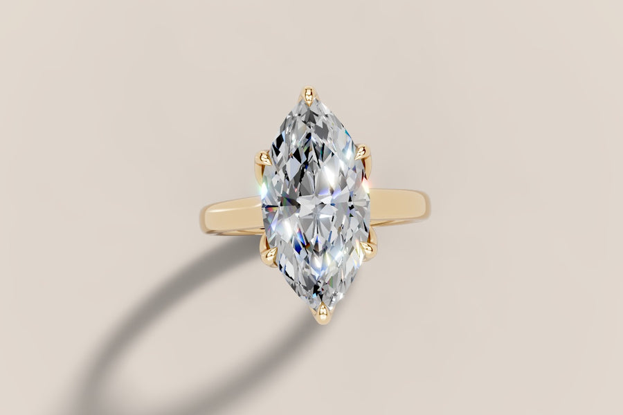 Marquise diamond solitaire engagement ring in 14k gold, hand-made by Asik Jewelry Los Angeles