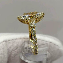 Load image into Gallery viewer, Side profile of the cathedral basket, hidden halo and accent diamond