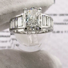 Load image into Gallery viewer, Radiant-cut diamond ring with its IGI report