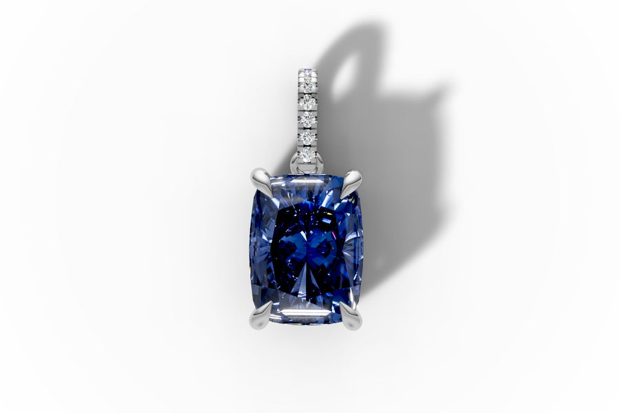 Cushion-cut blue sapphire pendant with pave diamond bail in 14k white gold, front view