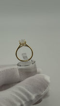 Load image into Gallery viewer, Marquise diamond solitaire engagement ring in 14k yellow gold with a plain polished cathedral band