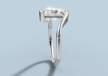 Load image into Gallery viewer, Low side profile of radiant lab diamond bypass engagement ring showing the open gallery beneath the floating center stone in 14k white gold