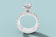 Load image into Gallery viewer, Front view of radiant diamond hidden halo ring showing the claw prongs and matching double band in 14k white gold