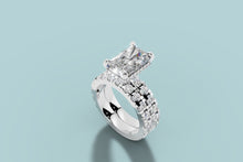 Load image into Gallery viewer, Angled view of radiant diamond double-band engagement ring with hidden halo in 14k white gold