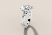 Load image into Gallery viewer, Elongated radiant-cut lab diamond engagement ring with tapered baguettes, angled view