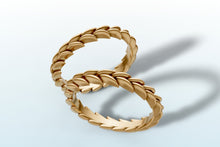 Load image into Gallery viewer, Close view of the two braided wheat bands in 14k yellow gold showing the layered leaf pattern