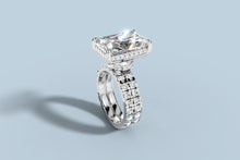 Load image into Gallery viewer, Three-quarter view of radiant lab diamond ring set showing the pave-lined basket and the two-row stack of round brilliants on the shank