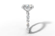 Load image into Gallery viewer, Side profile of oval diamond ring showing marquise and round diamonds in shared prongs