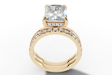 Load image into Gallery viewer, Front view showing the hidden halo of round brilliants beneath the radiant center