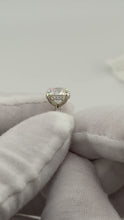 Load image into Gallery viewer, Close-up of the hidden halo beneath the round brilliant center stone