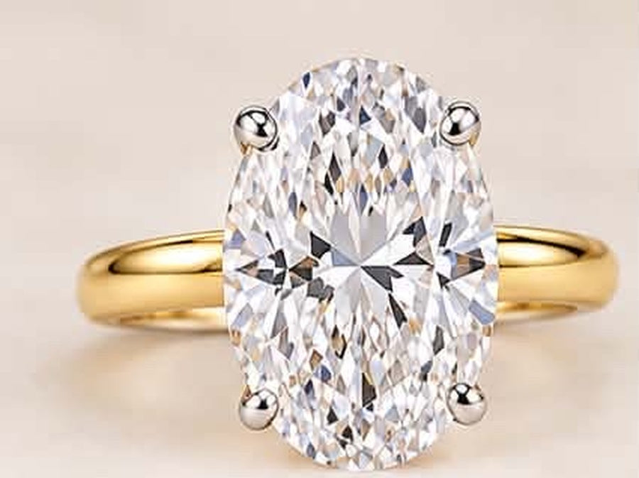 Design reference: oval solitaire in two-tone gold, top view