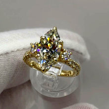 Load image into Gallery viewer, Marquise lab diamond cathedral ring with round accents in 14k yellow gold, top three-quarter view
