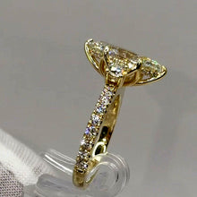 Load image into Gallery viewer, Hidden halo under the marquise, three-quarter side view
