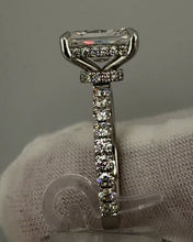 Load image into Gallery viewer, Side profile showing the hidden halo and diamond collar under the radiant
