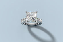 Load image into Gallery viewer, Front view of princess-cut lab diamond engagement ring with a row of round brilliants on each shoulder in 14k white gold
