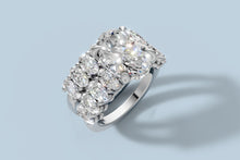 Load image into Gallery viewer, Oval lab diamond bridal set with hidden halo and oval-accent shank stacked with its matching oval band in 14k white gold, three-quarter view
