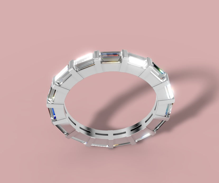 East-west baguette eternity band in 14k white gold with fifteen lab diamond baguettes in open bar settings, three-quarter view
