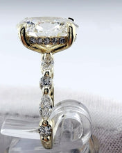 Load image into Gallery viewer, Side view showing the hidden halo under the oval diamond
