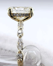 Load image into Gallery viewer, Side profile of the 14K yellow gold oval diamond ring
