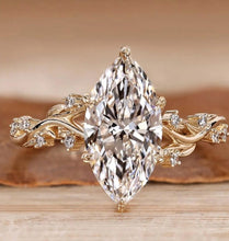 Load image into Gallery viewer, Design inspiration: marquise diamond on a vine-style yellow gold band
