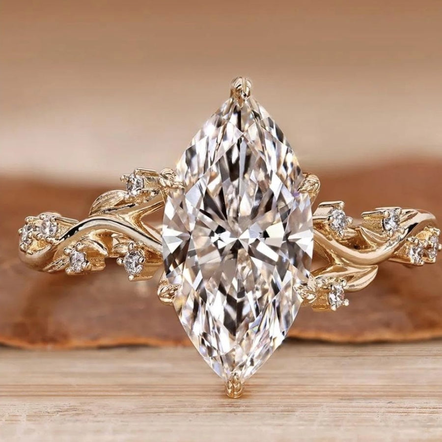 Design inspiration: marquise diamond on a vine-style yellow gold band