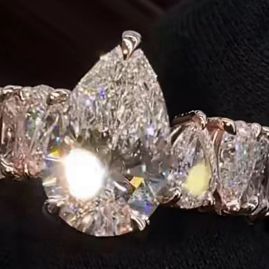 Design reference: pear diamond ring with pear-shaped side stones