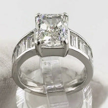 Load image into Gallery viewer, 4.05 carat radiant-cut lab-grown diamond ring with baguette shoulders, 14K white gold, front view
