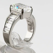 Load image into Gallery viewer, Radiant-cut diamond ring with channel-set baguettes, side view
