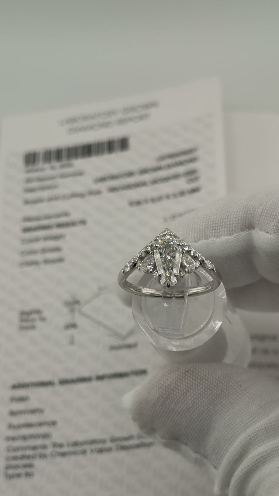 Coffin-cut lab diamond engagement ring in 14k gold, front view showing the marquise, pear and round diamond crown