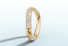 Load image into Gallery viewer, Standing view of 14k yellow gold pave dome band with diamonds wrapping halfway around the band
