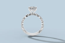 Load image into Gallery viewer, Front view of radiant lab diamond ring with hidden halo, four-prong basket and shared-prong accent stones down both sides of the band in 14k white gold
