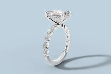 Load image into Gallery viewer, Angled side view of radiant lab diamond ring showing the hidden halo under the center stone and the alternating marquise and round diamonds on the shank
