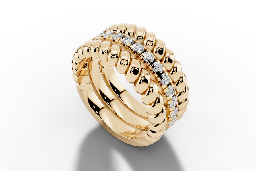Twisted rope and pave diamond band in 14k yellow gold, angled view showing two rope-twist rows framing a center row of pave-set round diamonds