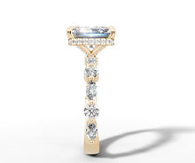 Load image into Gallery viewer, Side profile showing the pave hidden halo beneath the radiant center and the diamond shank in 14k yellow gold
