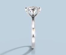 Load image into Gallery viewer, Side profile of round diamond solitaire ring showing the open tulip basket and slim tapered shank in 14k white gold
