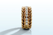 Load image into Gallery viewer, Front view of the ring set standing upright, round lab diamonds running down the center band between the wheat braids
