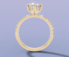 Load image into Gallery viewer, Front view of pear diamond engagement ring in 14k yellow gold with hidden halo and pave band
