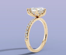 Load image into Gallery viewer, Angled view of pear lab diamond ring in 14k yellow gold with pave shank and hidden halo under the center

