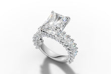 Load image into Gallery viewer, Radiant-cut lab diamond engagement ring with hidden halo and cluster pave band in 14k white gold, three-quarter view
