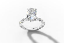 Load image into Gallery viewer, Front view of oval-cut lab diamond ring with marquise and round side stones in 14k gold
