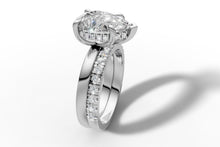 Load image into Gallery viewer, Hidden halo of round pave diamonds beneath the pear-cut center, 14k white gold basket detail
