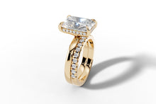 Load image into Gallery viewer, Elongated radiant-cut diamond ring in 14k yellow gold, three-quarter view showing the pave shank
