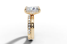 Load image into Gallery viewer, Side profile showing the hidden halo and recessed center pave row on the wide shank
