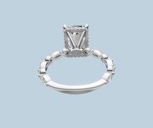 Load image into Gallery viewer, Underside view of radiant diamond ring showing the open gallery, hidden halo and the band of marquise and round diamonds
