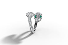 Load image into Gallery viewer, Side profile of 14k white gold snake ring with pave diamond body and emerald-eyed head
