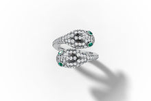 Load image into Gallery viewer, Top view of diamond snake wrap ring showing pave-set lab diamonds and emerald eyes in 14k white gold
