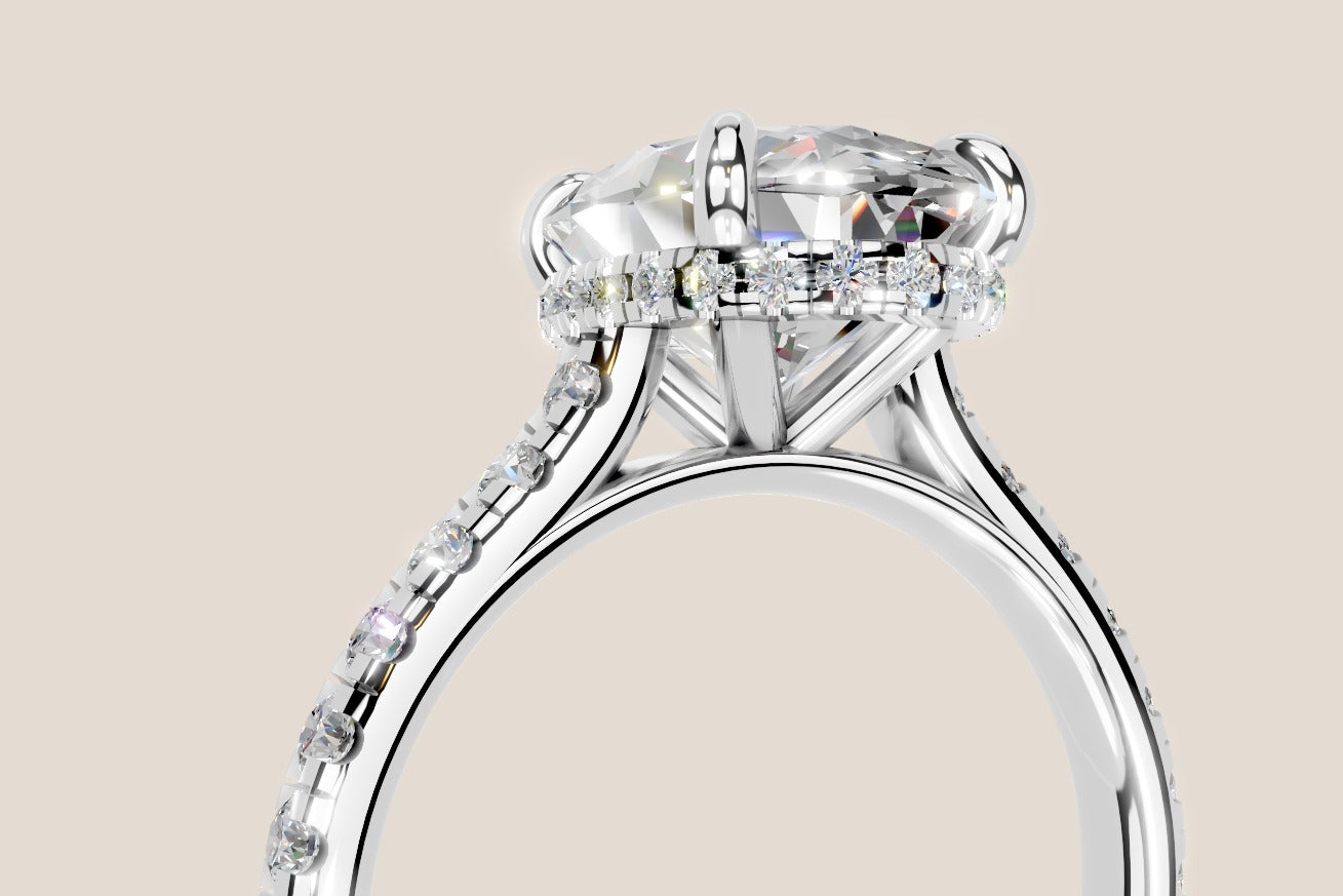 Oval diamond solitaire ring in 14k gold