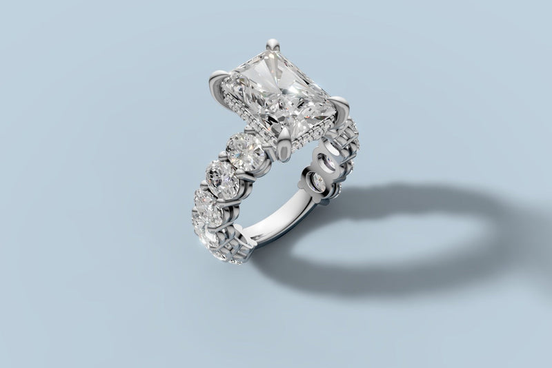Radiant and oval diamond statement ring in 14k gold